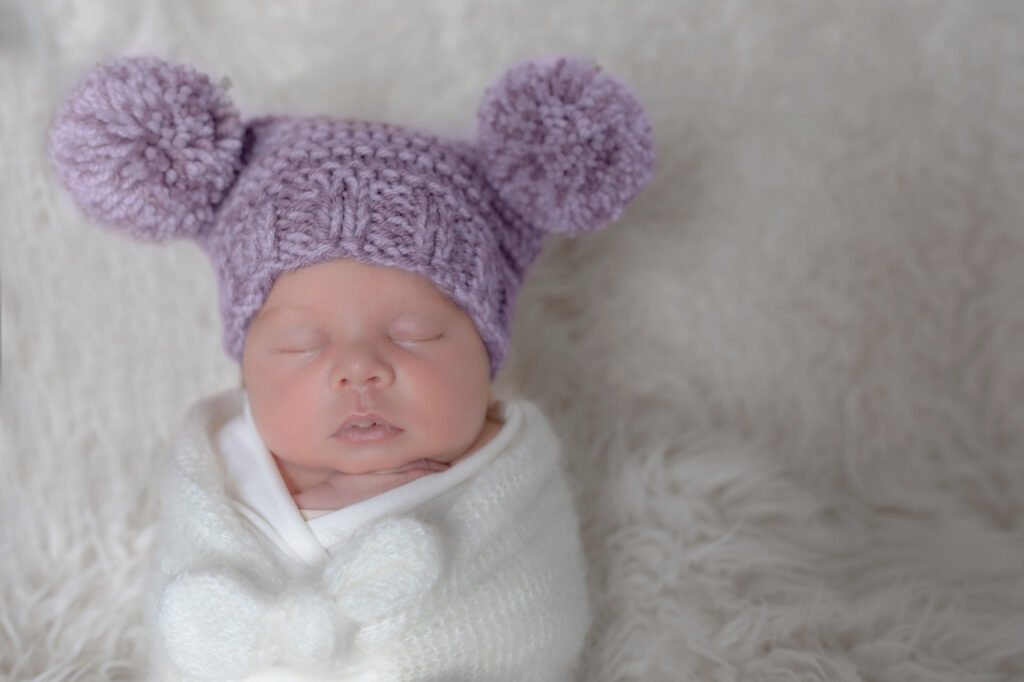 Newborn Photography using whites and lilacs Emma Lowe Photography
