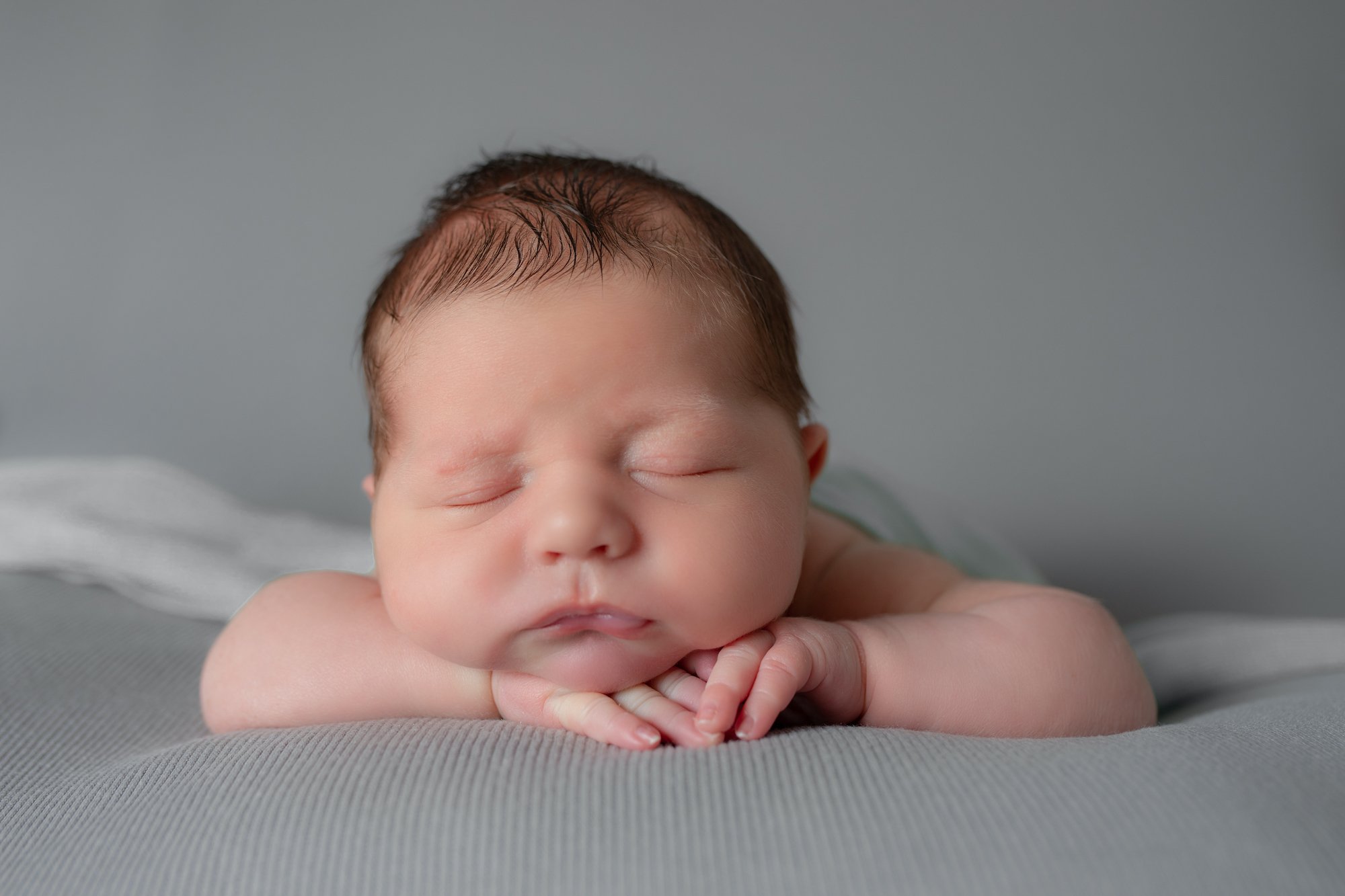 Grey Backdrop Newborn Photography by Emma Lowe Photography Baby Boy