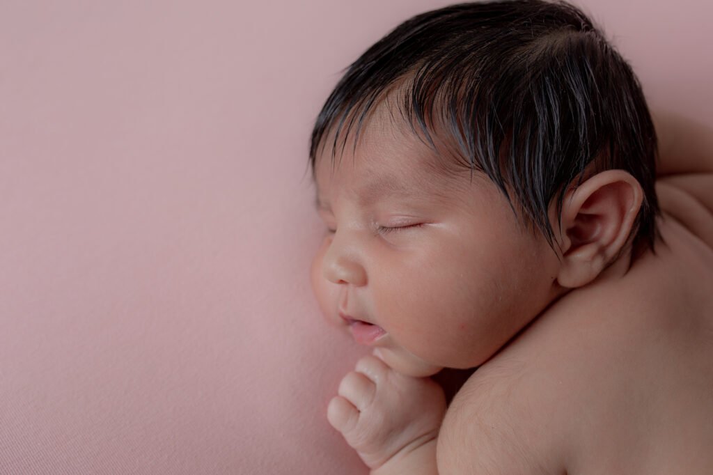 Baby Girl using pinks with Emma Lowe Newborn Photography